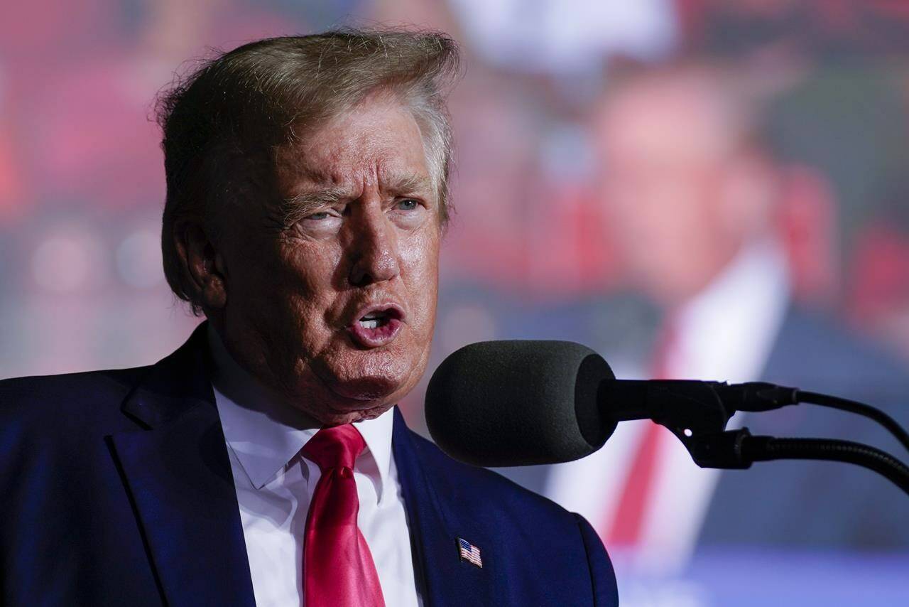 FILE - Former President Donald Trump speaks at a rally Friday, Aug. 5, 2022, in Waukesha, Wis. The National Archives and Records Administration recovered 100 documents bearing classified markings, totaling more than 700 pages, from a initial batch of 15 boxes retrieved from Mar-a-Lago earlier this year. That’s according to newly public correspondence with the Trump legal team. (AP Photo/Morry Gash, File)