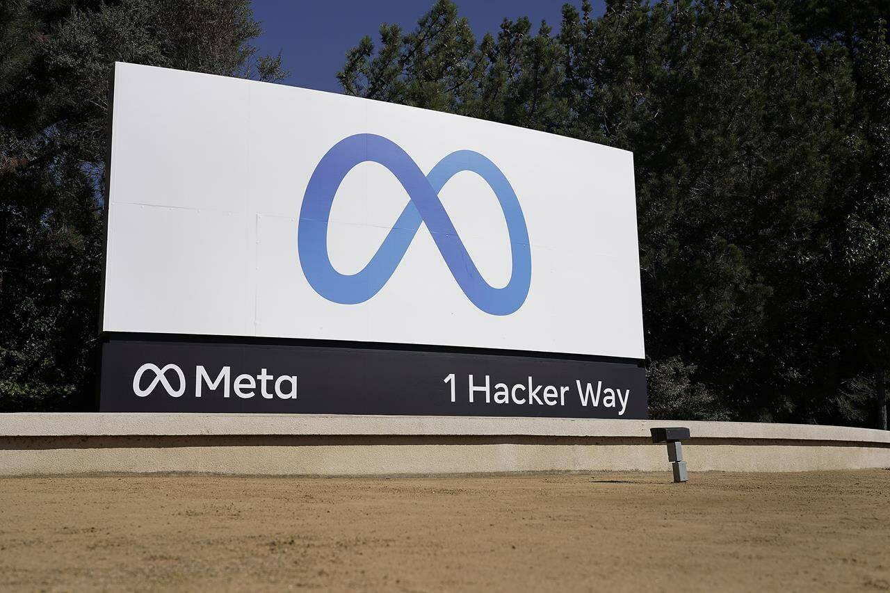 FILE - Facebook’s Meta logo sign is seen at the company headquarters in Menlo Park, Calif., on, Oct. 28, 2021. Facebook’s corporate parent has reached a tentative settlement, Friday, Aug. 26, 2022, in a lawsuit alleging the world’s largest social network service allowed millions of its users’ personal information to be fed to Cambridge Analytica, a firm that supported Donald Trump’s victorious presidential campaign in 201 (AP Photo/Tony Avelar, File)