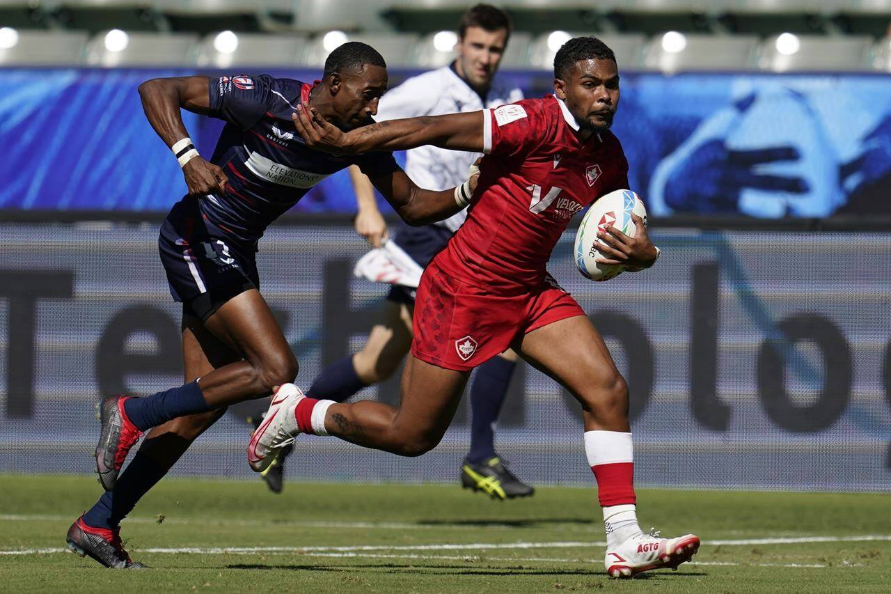 United States’ David Still attempts too tackle Canada’s Josiah Morra during their Los Angeles rugby sevens series pool match at Dignity Health Sports Park in Carson, Calif., Saturday, Aug. 27, 2022. (AP Photo/Marcio Jose Sanchez)