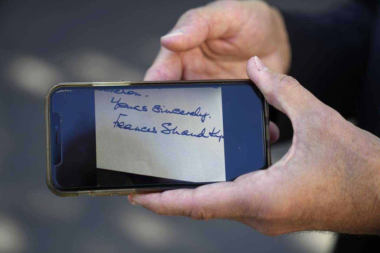 French Emergency Doctor Frederic Maillez, who was first to arrive at the scene of the crash that killed Britain’s Diana, Princess of Wales, displays a copy of the letter he received from Diana’s mother, during an interview with The Associate Press, next to the Pont de l’Alma tunnel, in Paris, Wednesday, Aug. 24, 2022. It has been nearly 25 years since Princess Diana died in a high-speed car crash in Paris. The French doctor who treated her at the scene has recounted what happened. Dr. Frederic Mailliez told The Associated Press how he tried to save her on that night of Aug. 31, 1997. (AP Photo/Francois Mori)