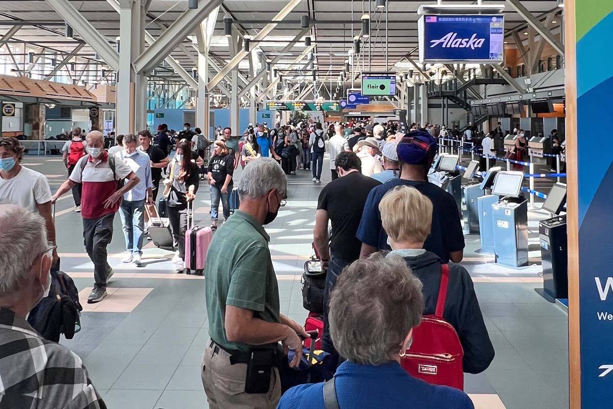 Security line ups stretched throughout the YVR airport in Vancouver Aug. 28, causing multi-hour delays for some travellers. (@KalebKorol/Twitter)
