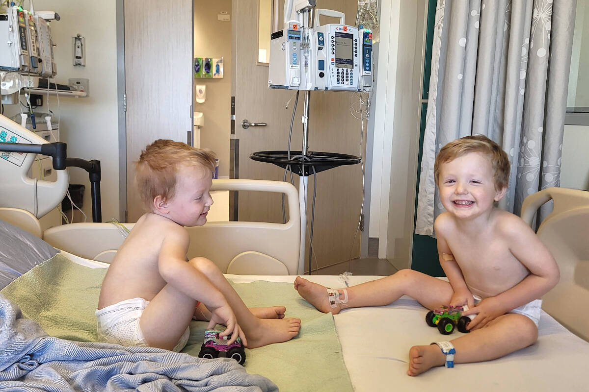 Identical twin brothers Weston, left and Bennett, right, both have leukemia and are making regular trips from their Murrayville home to BC Children’s Hospital for treatment. (GoFundMe)