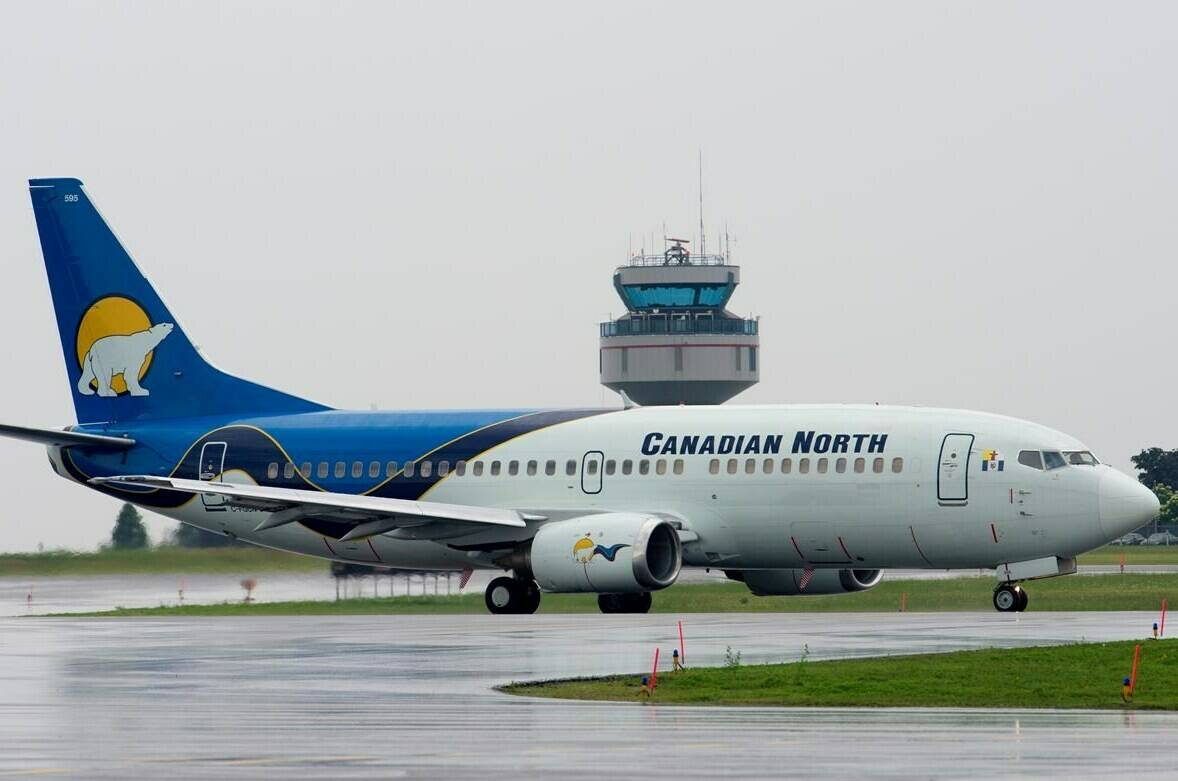 A Canadian North plane taxis to a runway before takeoff on June 26, 2019 in Ottawa. Canadian North says an ongoing shortage of fuel at some airports in the High Arctic and inclement weather are causing significant disruptions to its operations. THE CANADIAN PRESS/Adrian Wyld