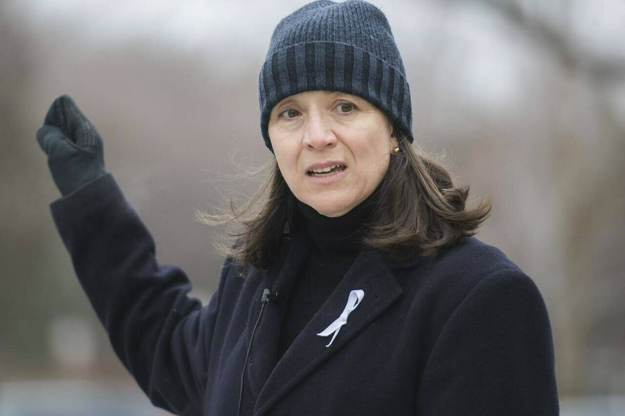 Nathalie Provost, a survivor of the École Polytechnique shooting in 1989 speaks during an event in Montreal, Sunday, Dec. 6, 2020. Gun control advocates are sounding out Quebec’s main political parties ahead of the Oct. 3 election to see where they stand. THE CANADIAN PRESS/Graham Hughes