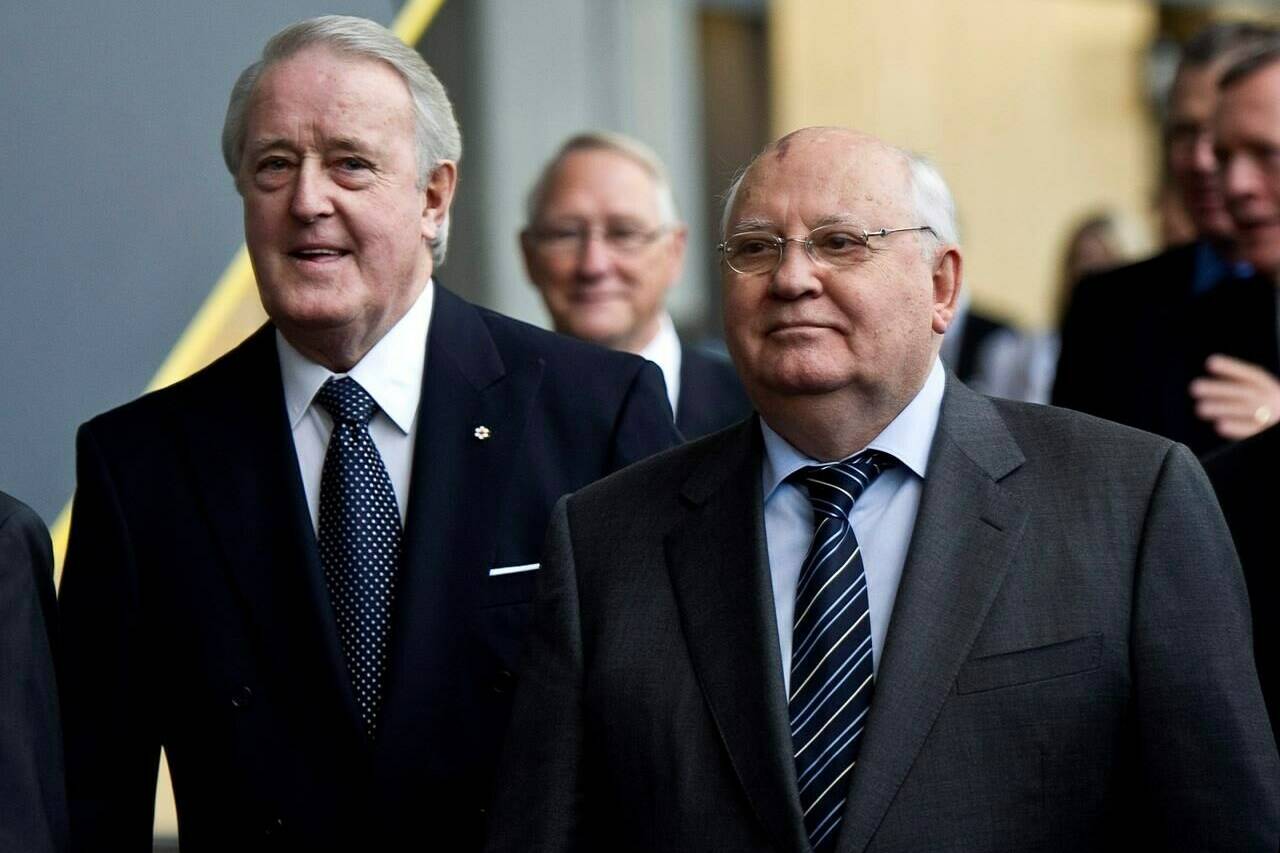 Former Soviet president Mikhail Gorbachev arrives to deliver a luncheon speech accompanied by former prime minister Brian Mulroney Friday, October 21, 2011 in Montreal. Gorbachev, the last leader of the Soviet Union, died Tuesday. He was 91.THE CANADIAN PRESS/Paul Chiasson