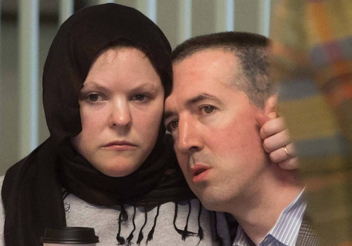 John Nuttall, right, and Amanda Korody sit at B.C. Supreme Court after a judge ruled the couple were entrapped by the RCMP in a police-manufactured crime, in Vancouver on Friday, July 29, 2016. The two are now suing police and government for damages related to the entrappment. (THE CANADIAN PRESS/Darryl Dyck)