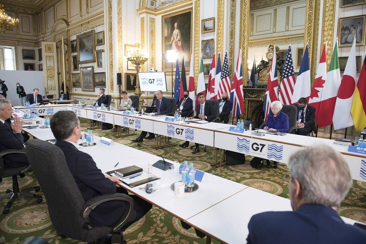 FILE - Britain’s Chancellor of the Exchequer Rishi Sunak, center back, and U.S. Treasury Secretary Janet Yellen, back right, during a meeting of finance ministers from across the G7 nations at Lancaster House in London, on June 4, 2021. Finance ministers from the Group of Seven industrial powers have pledged to put in place a system designed to cap Russia’s income from oil sales, an idea the nations’ leaders had promised to explore in June. The aim is to reduce Russia’s revenues and, by doing so, its ability to fund its war in Ukraine, while also limiting the impact of the war on global energy prices. (Stefan Rousseau/Pool via AP, File)