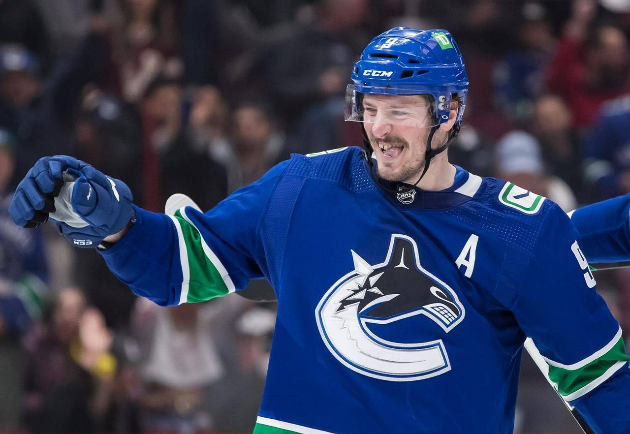 Vancouver Canucks’ J.T. Miller celebrates his goal during the third period of NHL hockey action against the Vegas Golden Knights, in Vancouver, B.C., Sunday, April 3, 2022. The Canucks announced over social media they’ve signed a seven year, US$56-million deal for Miller, Vancouver’s leading scorer last season with 99 points in 80 games.THE CANADIAN PRESS/Darryl Dyck