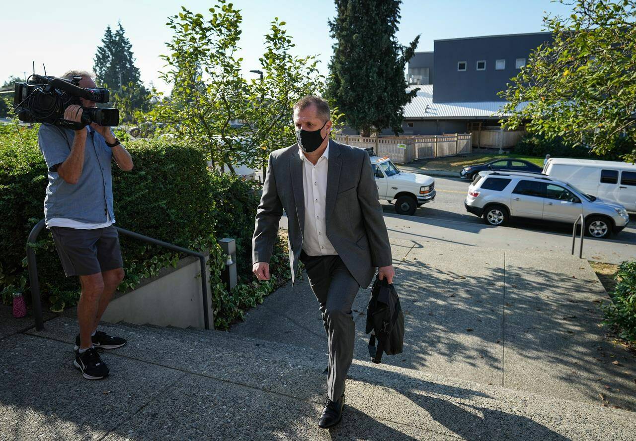 Former Vancouver Whitecaps and Canada U-20 women’s soccer coach Bob Birarda arrives at provincial court for his sentencing hearing in North Vancouver, B.C., on Friday, September 2, 2022. Birarda, 55, pleaded guilty in February to three counts of sexual assault and one count of sexual touching for offences involving four different people between 1988 and 2008. THE CANADIAN PRESS/Darryl Dyck