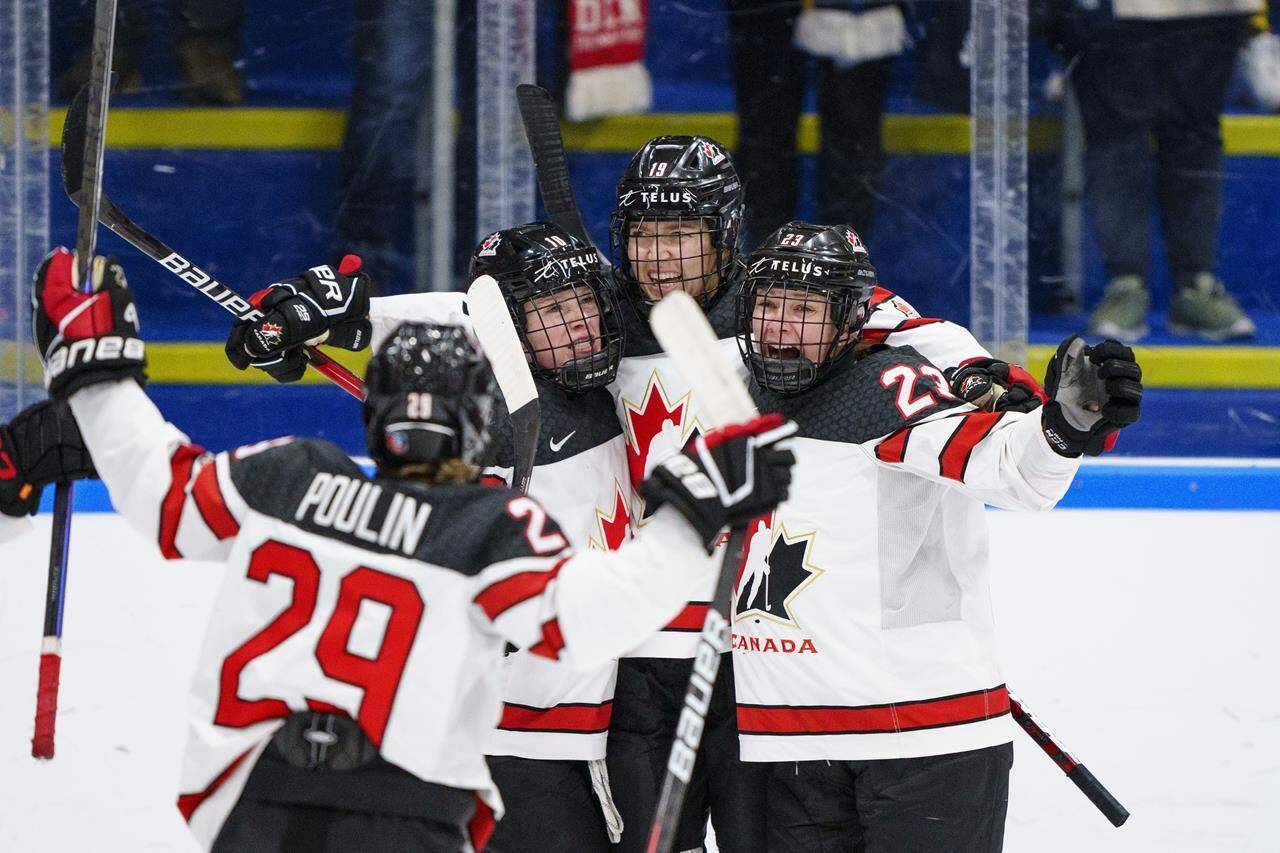 Canada players celebrate after Brianne Jenner (second right) scored her second goal of the game during the IIHF World Championship Woman’s ice hockey gold medal match between USA and Canada in Herning, Denmark, Sunday, Sept. 4, 2022. THE CANADIAN PRESS/AP-Bo Amstrup/Ritzau Scanpix via AP