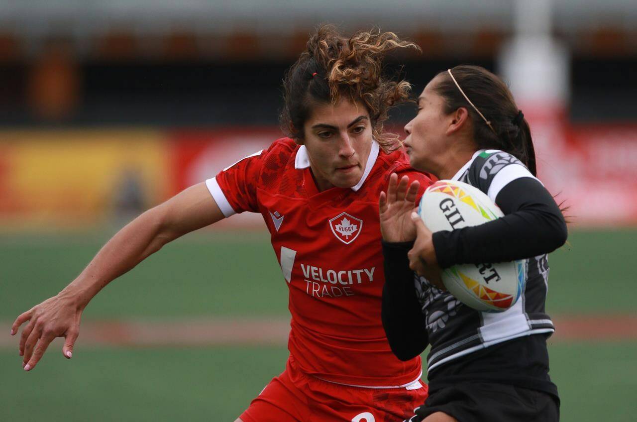 Canada’s Bianca Farella of Canada looks to tackle Daniela Alvarado of Mexico during first half rugby action at the HSBC World Rugby Women’s Sevens Series at Starlight Stadium in Langford, B.C., on Saturday, April 30, 2022. THE CANADIAN PRESS/Chad Hipolito
