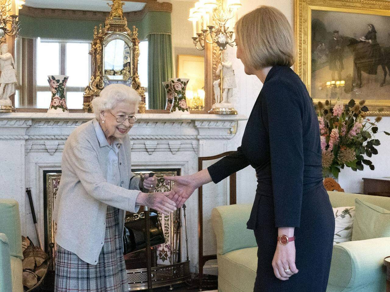 Britain’s Queen Elizabeth II, left, welcomes Liz Truss during an audience at Balmoral, Scotland, where she invited the newly elected leader of the Conservative party to become Prime Minister and form a new government, Tuesday, Sept. 6, 2022.THE CANADIAN PRESS/AP-Jane Barlow/Pool Photo via AP