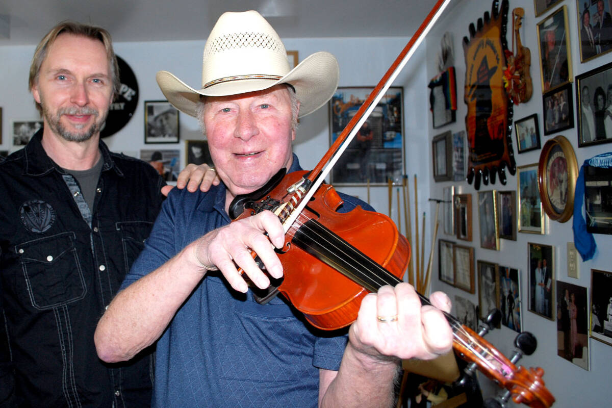 Elmer Tippe has passed away. Born in 1933, he made a tremendous impact on country music, as a radio DJ and as a musician. He was pictured here in 2011 with his son, Rick, also a musician. (Black Press Media files)