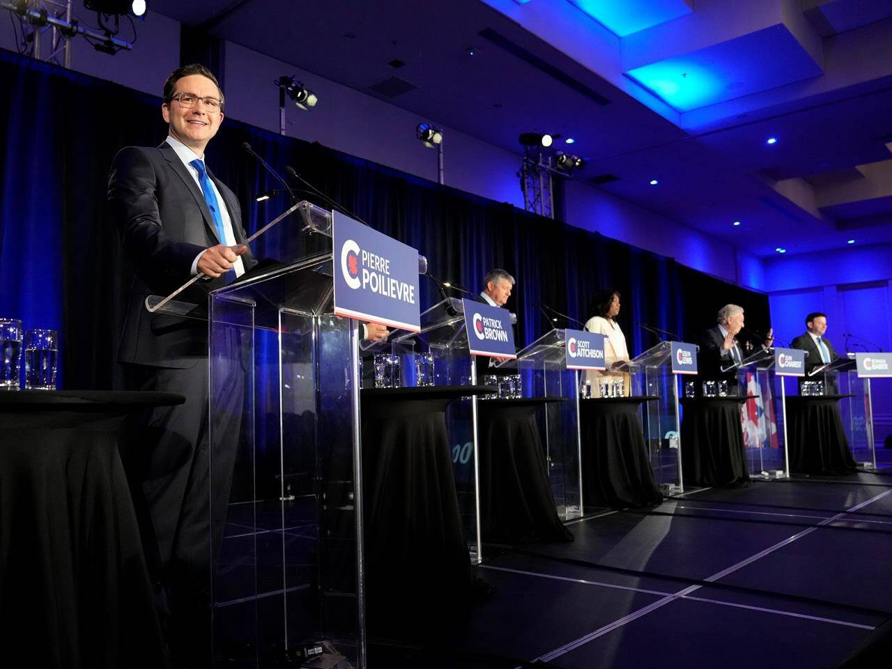 Conservative leadership hopeful Pierre Poilievre, left, smiles as he takes part in the Conservative Party of Canada French-language leadership debate in Laval, Quebec on Wednesday, May 25, 2022. The Conservative Party of Canada will announce its next leader in Ottawa tonight, after candidates and supporters spent the past seven months on its third leadership contest in six years. THE CANADIAN PRESS/Ryan Remiorz