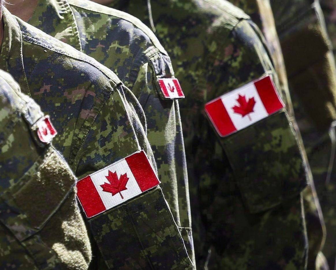 Members of the Canadian Armed Forces march in Calgary on July 8, 2016. Canada’s military watchdog says his office has received fewer than a dozen complaints from service members about the Armed Forces’ vaccine requirement, and that an investigation into each has found no foul play.THE CANADIAN PRESS/Jeff McIntosh