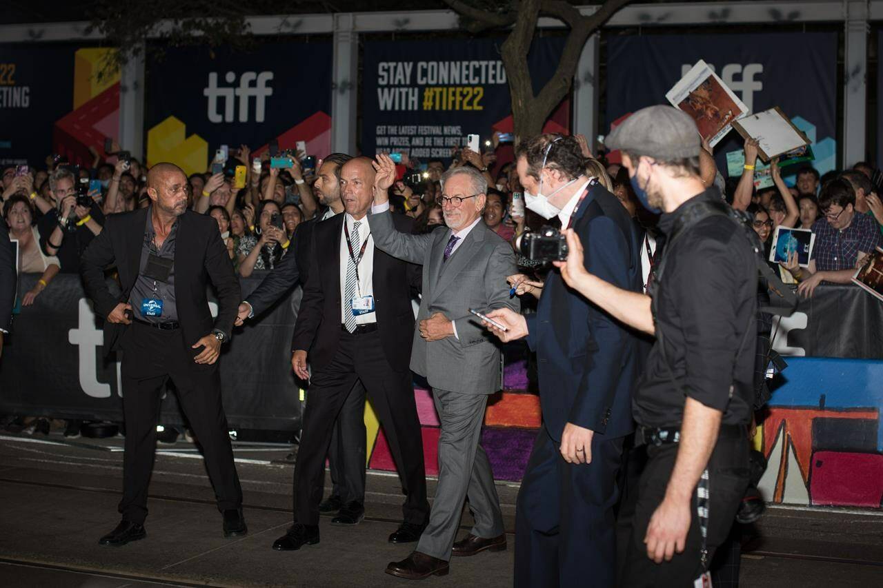 Director Steven Spielberg waves to fans during the red carpet premier of his film, The Fabelmans, at Princess of Wales Theatre during the Toronto International Film Festival on, Saturday, September 10, 2022. THE CANADIAN PRESS/ Tijana Martin