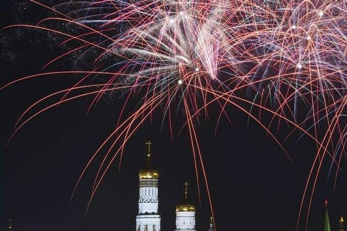 Fireworks explode over the Ivan the Great Bell Tower inside the Moscow Kremlin during the celebration of Moscow City Day in Moscow, Russia, Saturday, Sept. 10, 2022, for the 875th anniversary of the city’s founding. (AP Photo/Maxim Marmur)