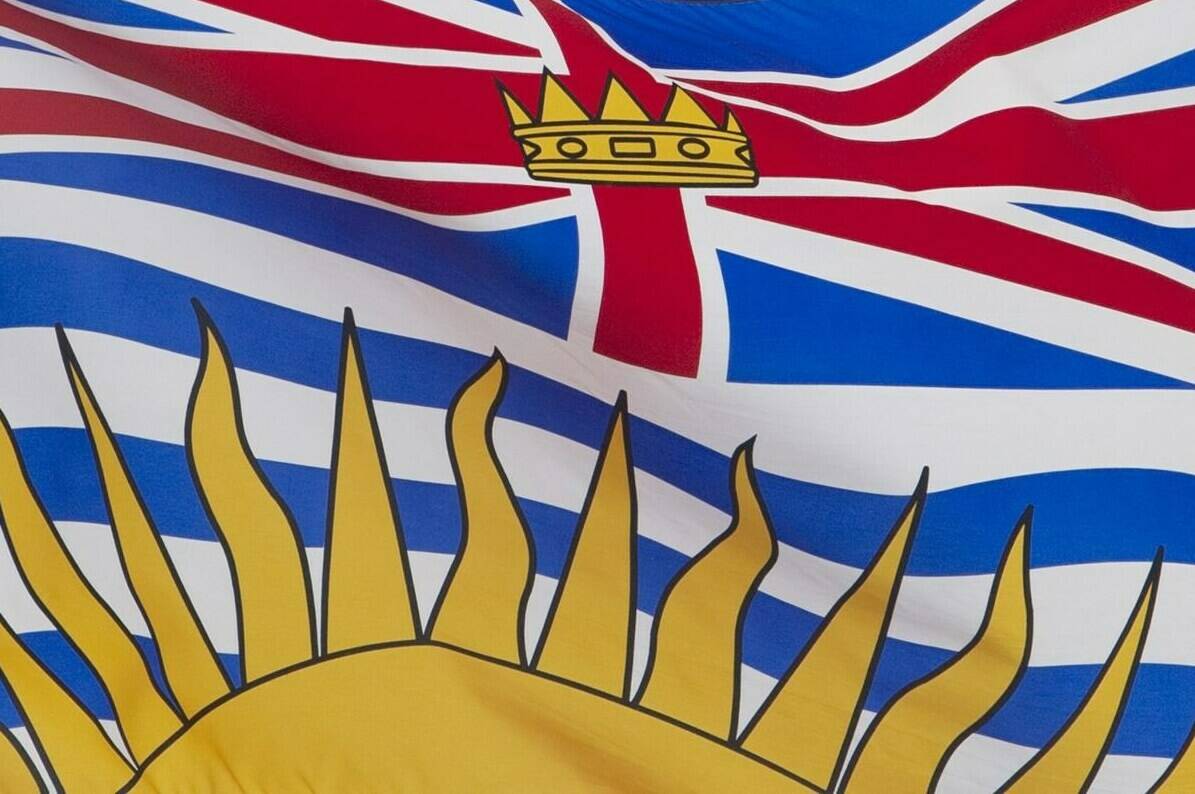 British Columbia's provincial flag flies on a flag pole in Ottawa, Friday Jul. 3, 2020. Municipal elections are still more than a month away, but mayors for dozens of communities across B.C. have already won by acclamation after standing unopposed. THE CANADIAN PRESS/Adrian Wyld