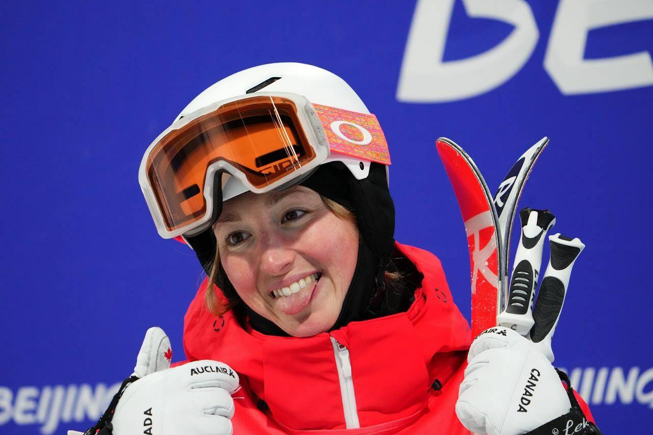 Chloé Dufour-Lapointe, of Canada, smiles after her run during women’s moguls finals at the Beijing Winter Olympics in Zhangjiakou, China, on Sunday, Feb. 6, 2022. Six months after becoming the first Canadian freestyle skier to compete in four Olympic Games, Chloe Dufour-Lapointe is retiring. THE CANADIAN PRESS/Sean Kilpatrick