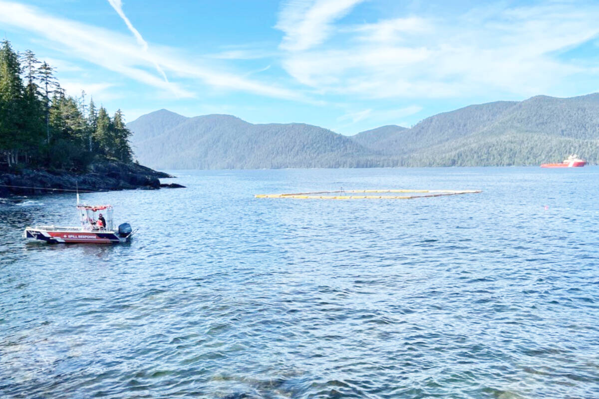 The Canadian Coast Guard placed sorbent boom around the M.V. Island Bay boat in Carpenter Bay, to contain any potential pollution, after the vessel sunk on Sept. 10. (Photo: Canadian Coast Guard facebook page)