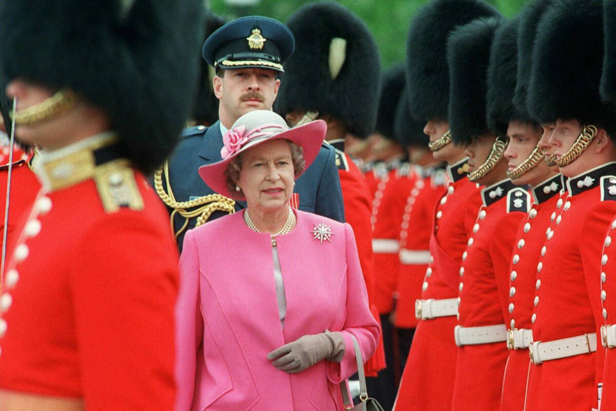 Queen Elizabeth II inspects the Ceremonial Guard on Parliament Hill, during Canada Day celebrations, in Ottawa, July 1, 1992. THE CANADIAN PRESS/Fred Chartrand
