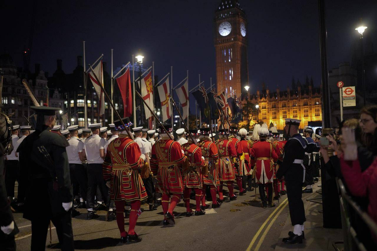 Guards and Royal Navy soldiers take part in a rehearsal for the funeral procession of Queen Elizabeth II in London, Thursday, Sept. 15, 2022. The Queen will lie in state in Westminster Hall for four full days before her funeral on Monday, Sept. 19. For some Canadians the queen’s funeral on Monday will be observed with sadness and filled with emotional connections to their own lives, while for others it’s a far-off event they intend to miss.THE CANADIAN PRESS/AP-Markus Schreiber
