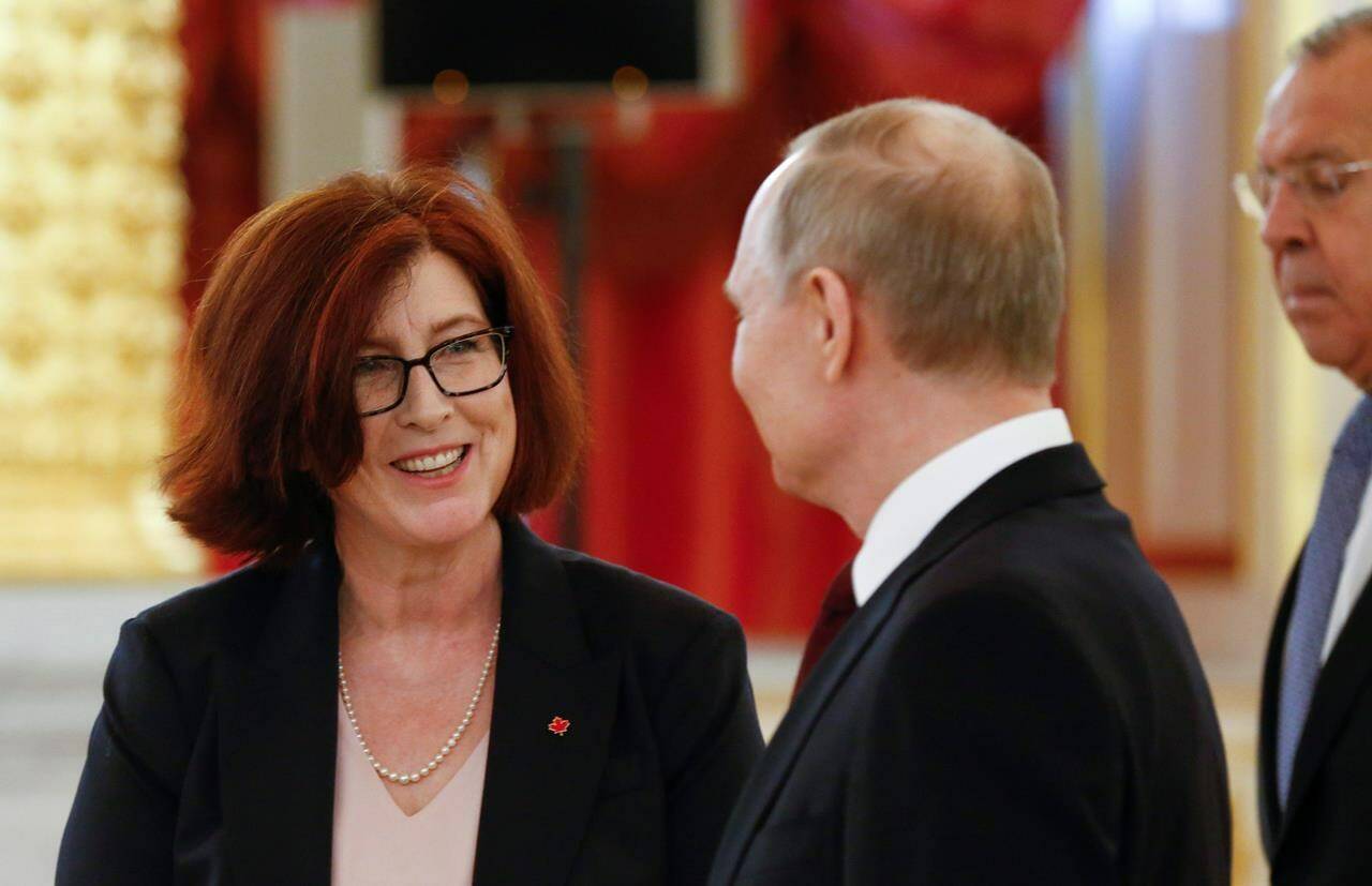 Russian President Vladimir Putin, centre, speaks with Canada’s ambassador to Russia Alison LeClaire as Russian Foreign Minister Sergei Lavrov, right, looks on during a ceremony in Kremlin, in Moscow, Russia, Wednesday, Feb. 5, 2020. THE CANADIAN PRESS/AP-Alexander Zemlianichenko, Pool