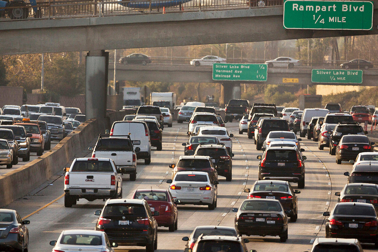 Pictured is traffic on the Hollywood Freeway in Los Angeles. A UVic researcher found carbon pricing mixed with subsidies for drivers to choose cleaner options was one of the most effective mixes at reducing transportation emission in Europe. (AP Photo/Damian Dovarganes, File)