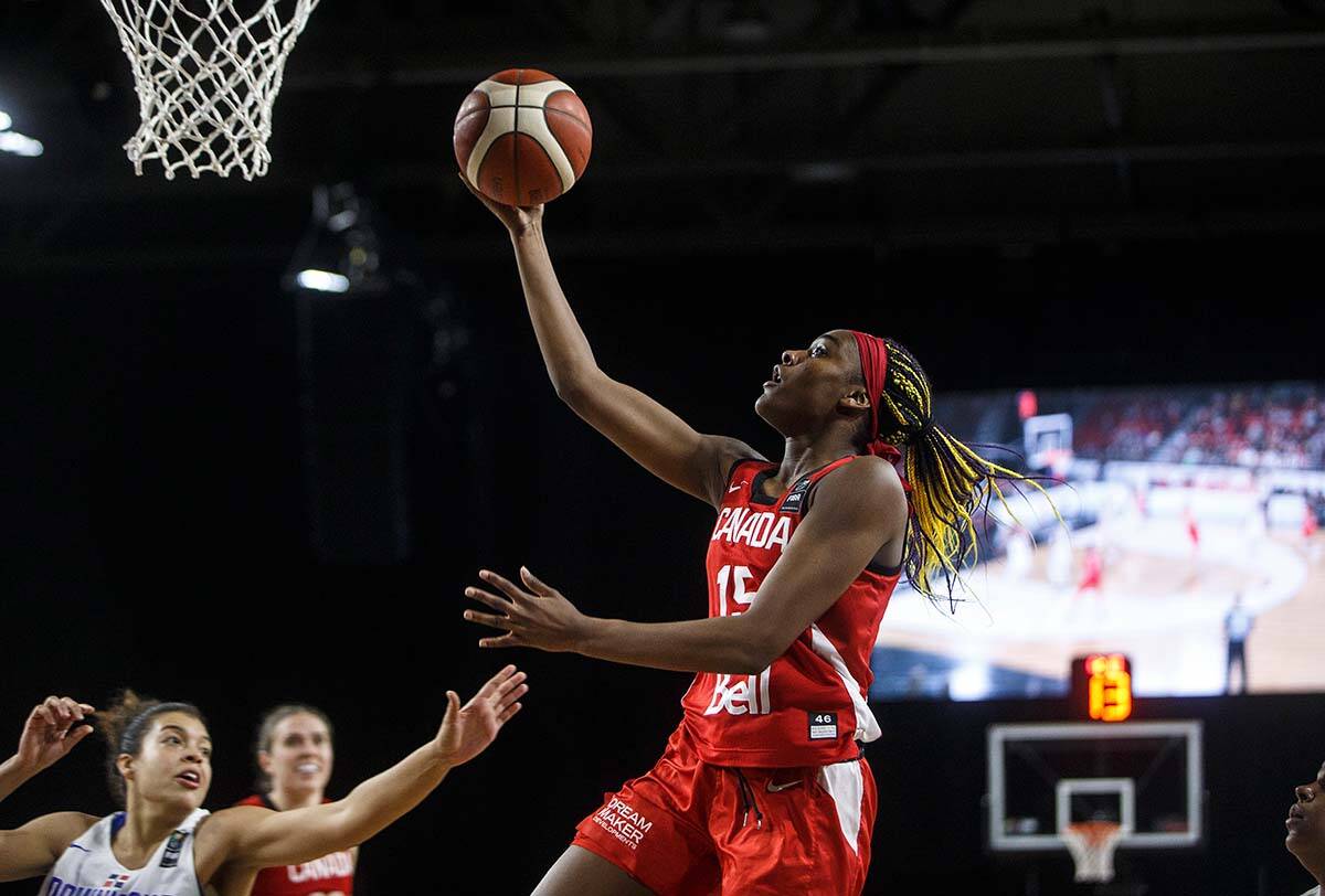In this Novermeber 2019 file photo, Canada’s Aaliyah Edwards (15) goes up for the shot against the Dominican Republic during second half action of FIBA Women’s Olympic Pre Qualifying Tournaments Americas 2019, in Edmonton. (THE CANADIAN PRESS/Jason Franson)