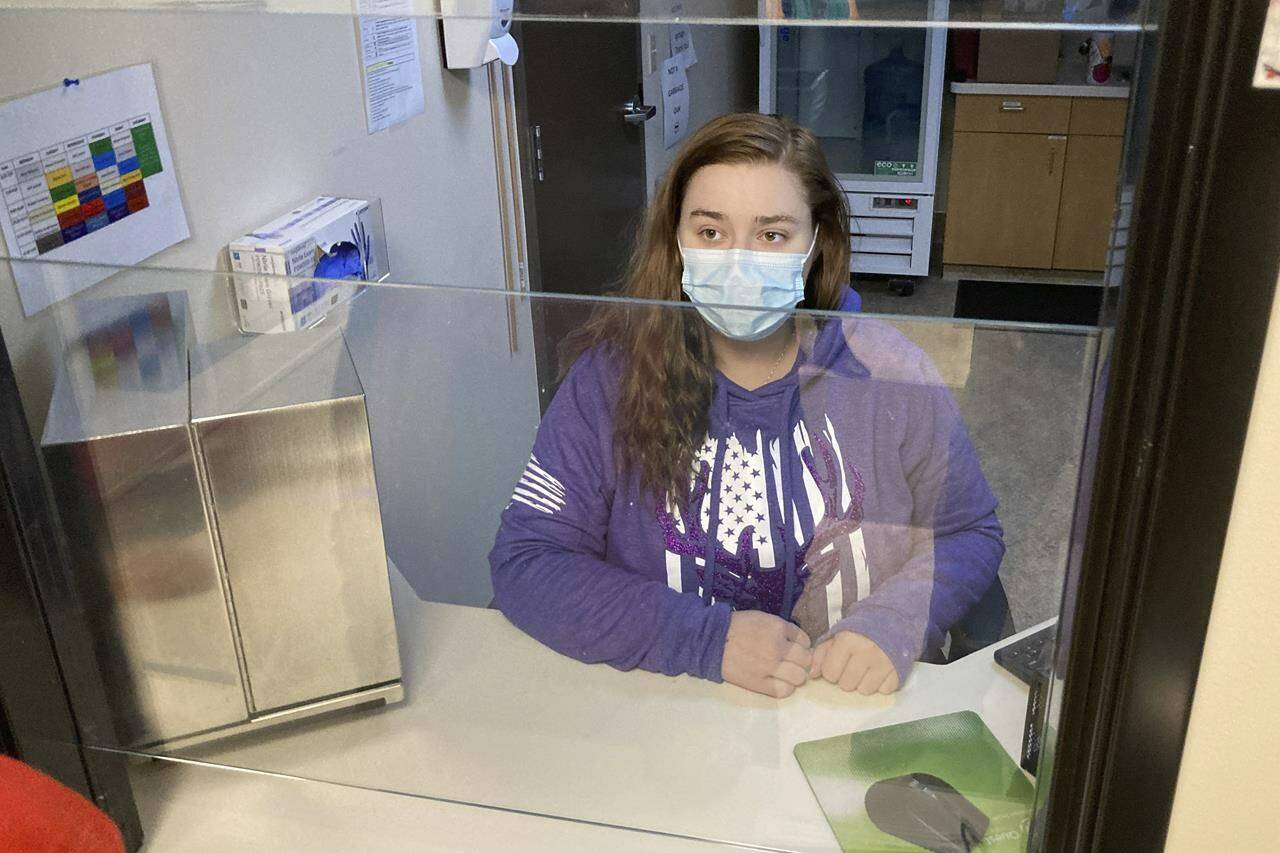 FILE—Vanessa Caudel, a nurse, sits at her work station in the Great Circle treatment center on Feb. 24, 2022, in Salem, Ore., where she provides doses of methadone, which can relieve the “dope sick” symptoms a person in opioid withdrawal experiences. Almost two years after Oregonians voted to decriminalize drugs and dedicate hundreds of millions of dollars to treatment services, the pioneering effort has been struggling to show progress. (AP Photo/Andrew Selsky, File)