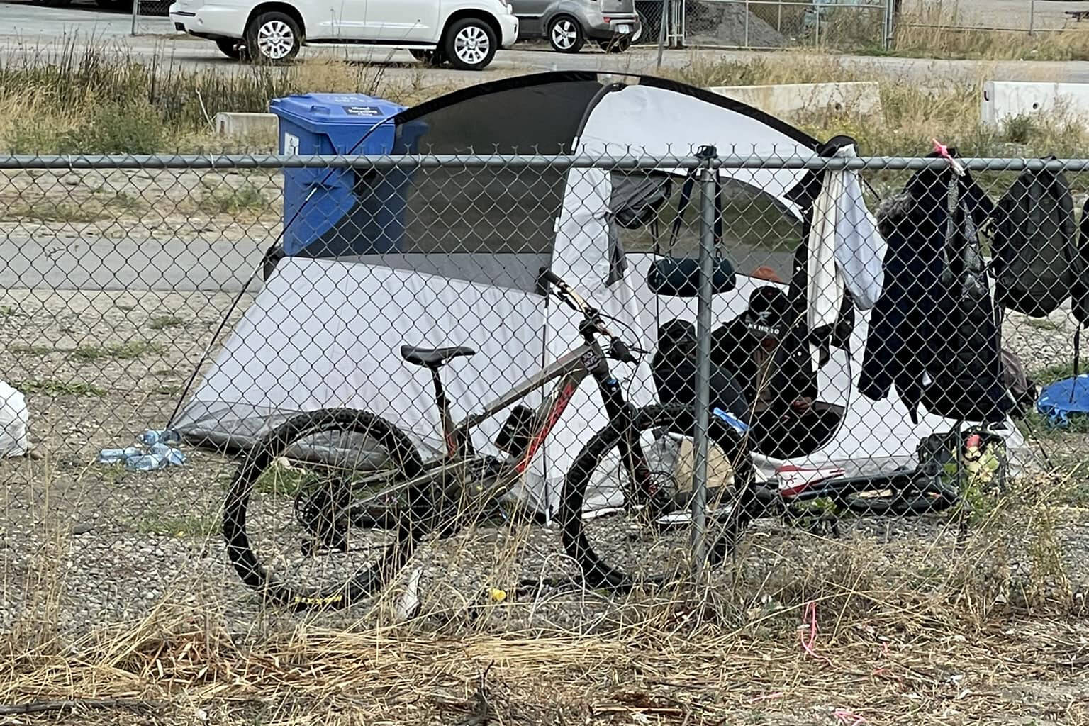 A person living in a tent (not pictured) was run over and dragged by the driver of a Dodge Ram at the Rail Trail homeless encampment. The person was taken to hospital with significant injuries. (Facebook)
