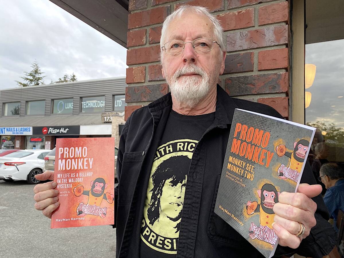 Retired music promotions rep RayMan Ramsay, a South Surrey resident, with the two “Promo Monkey” books he’s authored. (Photo: Tom Zillich)