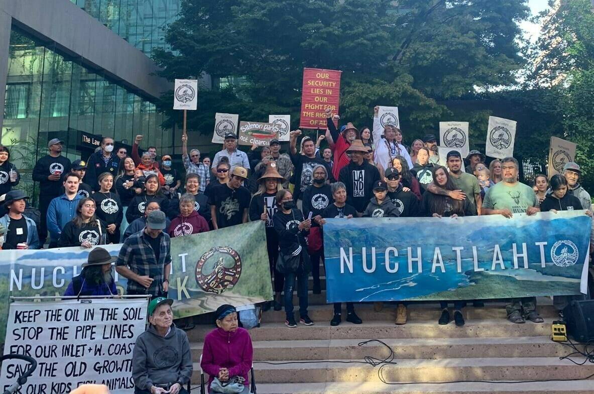 Nuchatlaht and Nuu-chah-nulth First Nation leaders and supporters rally at the BC Supreme Court in Vancouver on Tuesday, Sept. 27, 2022, ahead of closing arguments in an Indigenous title case between the Nuchatlaht First Nation and the B.C. government. THE CANADIAN PRESS/Brieanna Charlebois