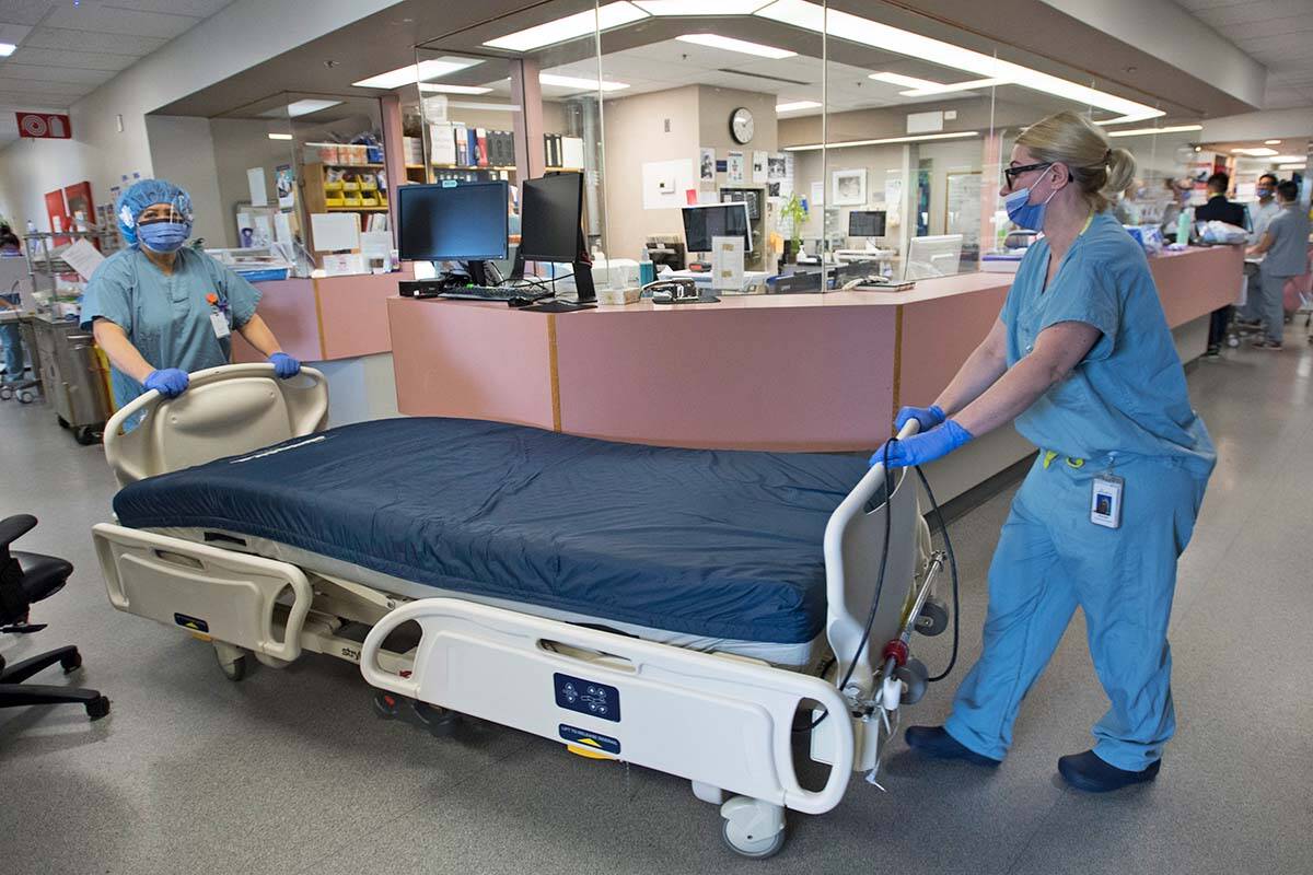 A bed in need of cleaning is moved in the COVID-19 intensive care unit at St. Paul’s hospital in downtown Vancouver, Tuesday, April 21, 2020. THE CANADIAN PRESS/Jonathan Hayward