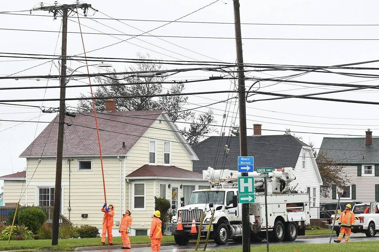 Crews from Nova Scotia Power work on reconnecting the power grid to the Glace Bay Hospital knocked out by Hurricane Fiona, in Glace Bay, N.S., Monday, Sept. 26, 2022. The premier of Nova Scotia has issued a stinging rebuke to the telecommunications companies that serve the province, saying too many Nova Scotians are still without cellphone service, four days after post-tropical storm Fiona roared across Atlantic Canada. THE CANADIAN PRESS/Vaughan Merchant