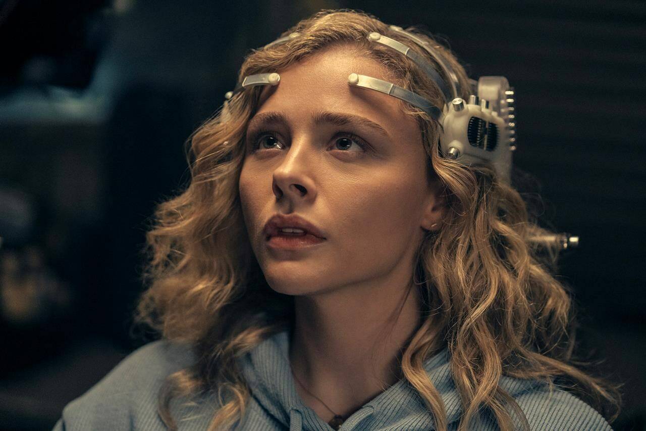 Chloë Grace Moretz plugs into the virtual reality headset of “The Peripheral,” a new series on Prime Video starting Oct. 21. THE CANADIAN PRESS/HO-Prime Video