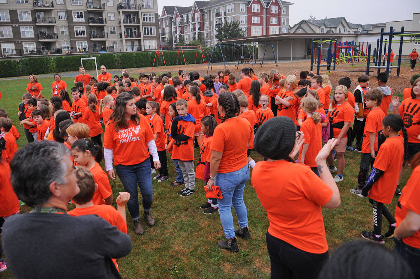 Teachers gather students together for a group photo at Bernard Elementary on Thursday, Sept. 29, 2022. The school’s parent advisory council bought an orange T-shirt for every single student at Bernard. (Jenna Hauck/ Chilliwack Progress)