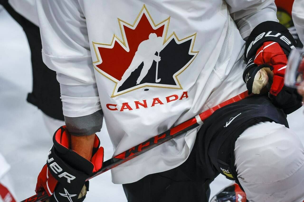 A Hockey Canada logo is shown on the jersey of a player with Canada’s National Junior Team during a training camp practice in Calgary, Tuesday, Aug. 2, 2022. THE CANADIAN PRESS/Jeff McIntosh