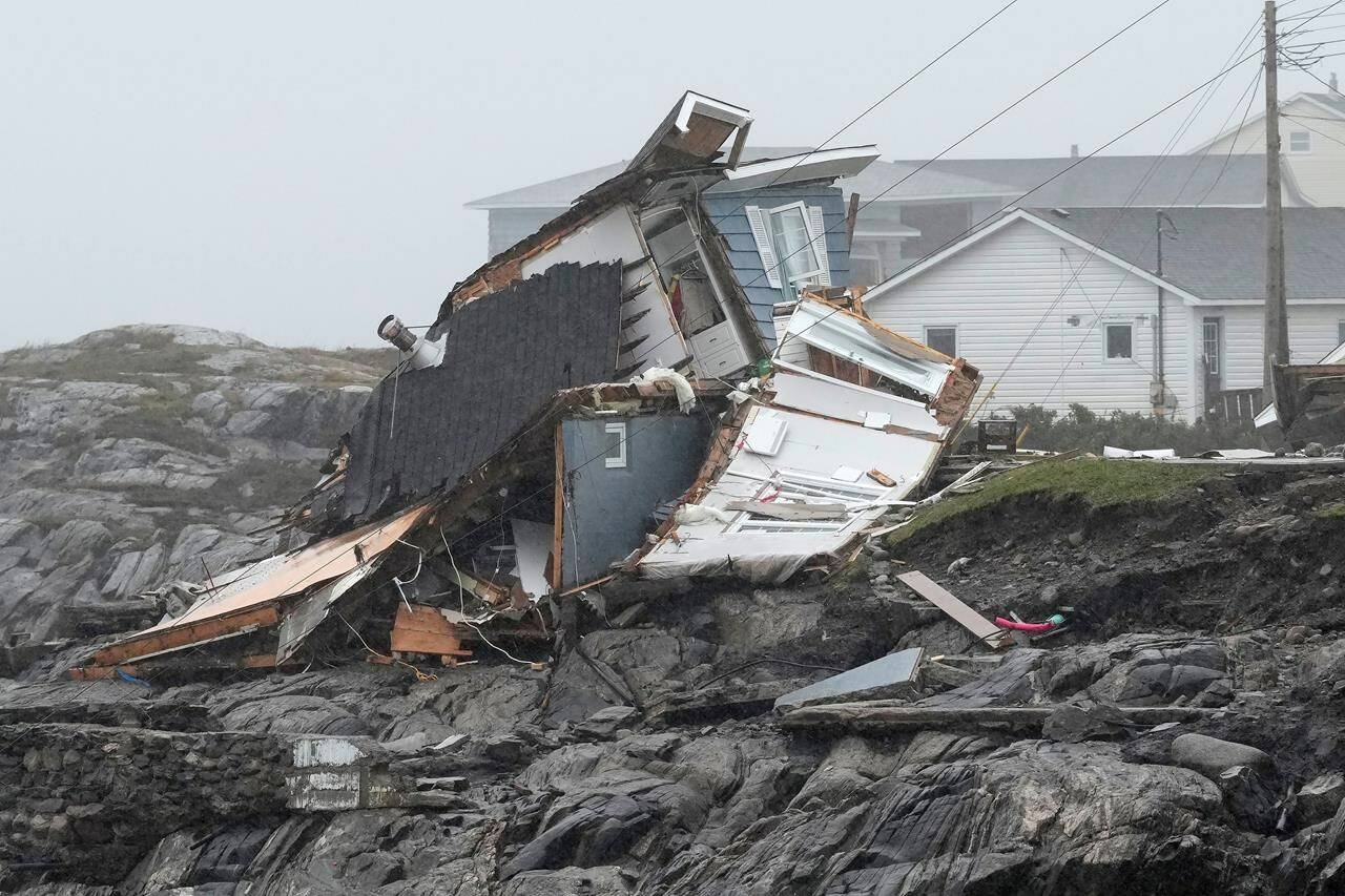 Remains of a home destroyed during hurricane Fiona are seen in Port aux Basques, N.L., Monday, Sept. 26, 2022. THE CANADIAN PRESS/Frank Gunn