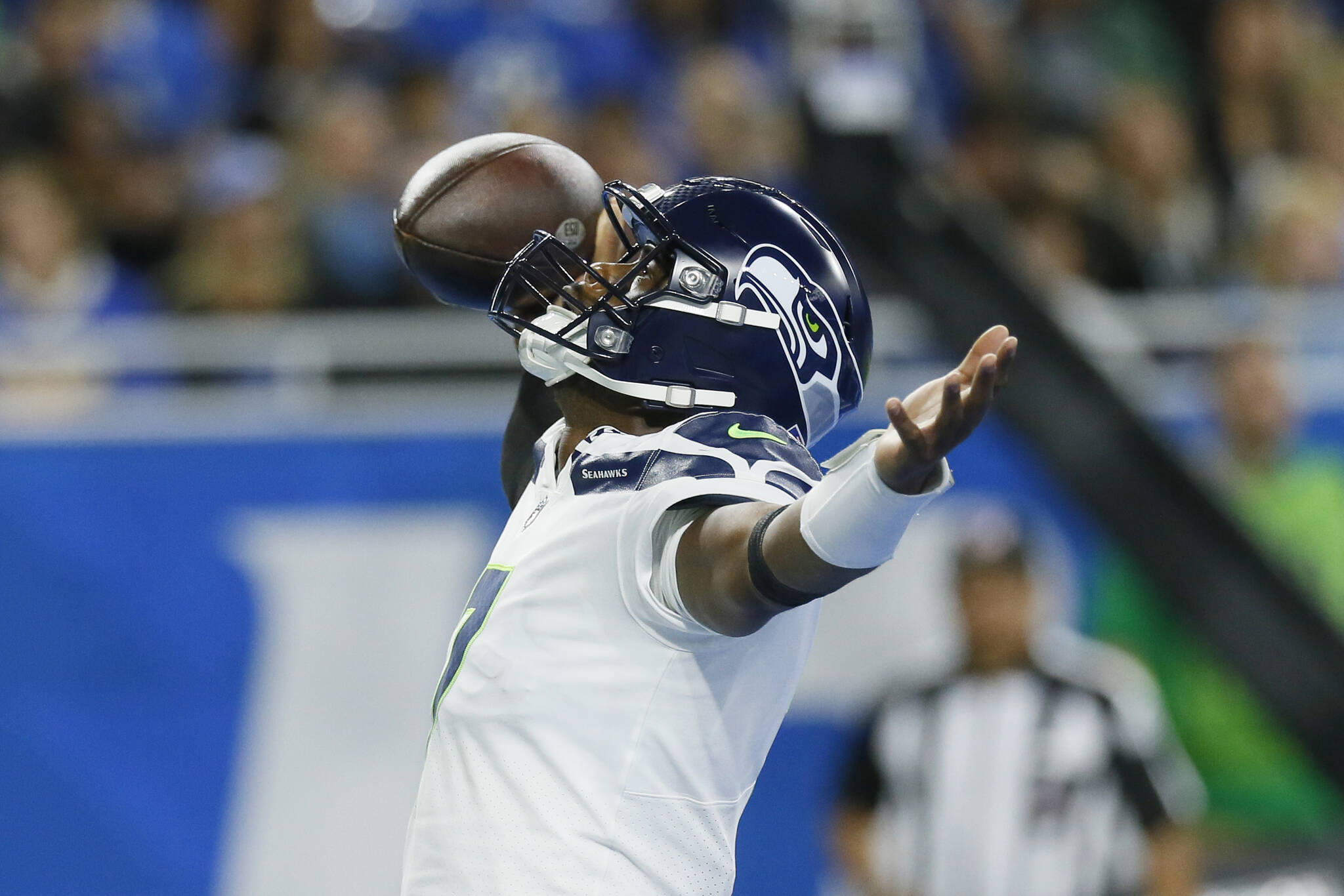 Seattle Seahawks quarterback Geno Smith reacts after his 8-yard touchdown run during the first half of an NFL football game against the Detroit Lions, Sunday, Oct. 2, 2022, in Detroit. (AP Photo/Duane Burleson)