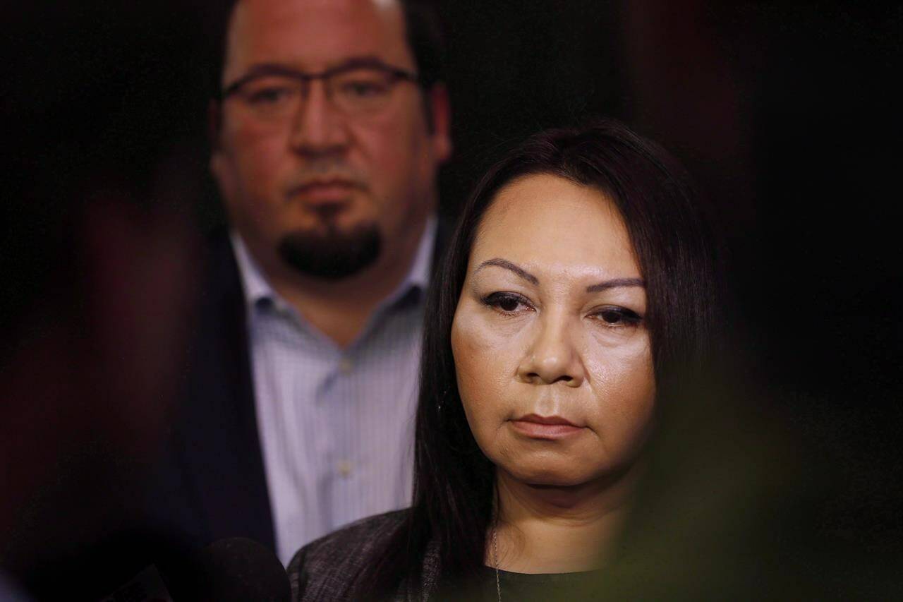 Sheila North Wilson, right, grand chief of Manitoba Keewatinowi Okimakanak, speaks to media as Derek Nepinak, grand chief of the Assembly of Manitoba Chiefs, listens in after RCMP announced at a press conference in Winnipeg, March 18, 2016. More than a year after North unsuccessfully ran to lead one of Manitoba’s largest First Nations political organizations, the Cree leader and journalist is ready to try again. THE CANADIAN PRESS/John Woods