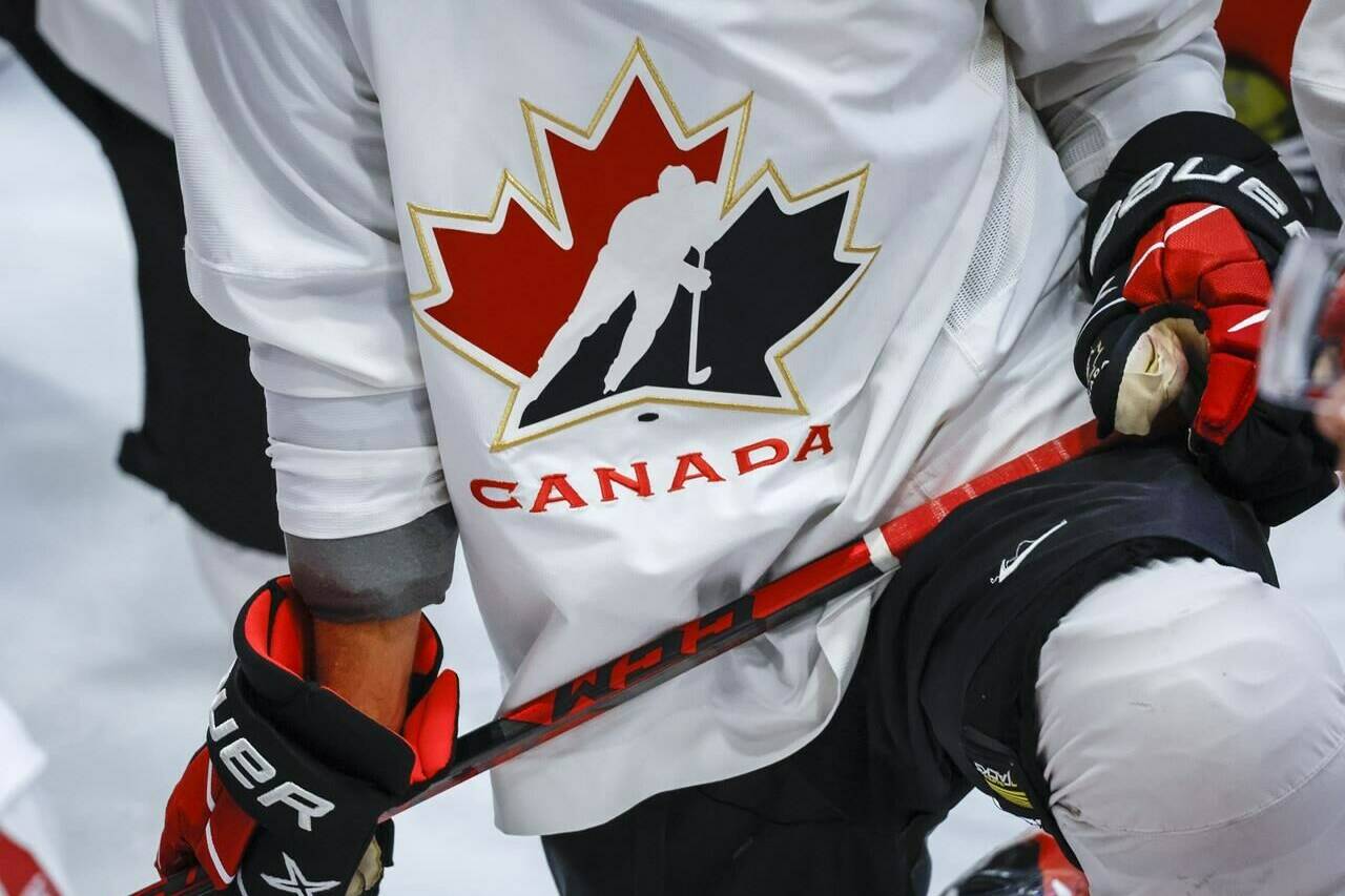 A Hockey Canada logo is shown on the jersey of a player with Canada’s National Junior Team during a training camp practice in Calgary, Alta., Tuesday, Aug. 2, 2022. Nike has suspended its partnership with and paused support for Hockey Canada as the sports organization faces increasing pressure to handle alleged sexual assaults. THE CANADIAN PRESS/Jeff McIntosh