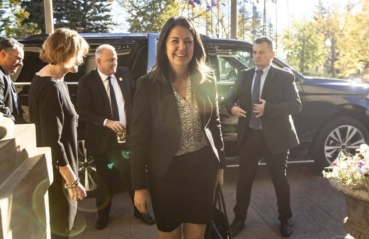 Danielle Smith arrives to be sworn in as Alberta premier in Edmonton on Tuesday, Oct. 11, 2022. THE CANADIAN PRESS/Jason Franson