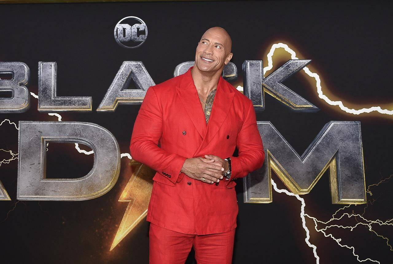 Dwayne Johnson attends the world premiere of “Black Adam” in Times Square on Wednesday, Oct. 12, 2022, in New York. (Photo by Evan Agostini/Invision/AP)