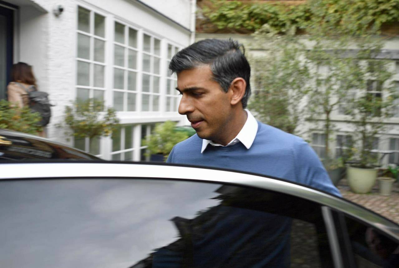 Former Treasury chief Rishi Sunak outside his home in London, Saturday Oct. 22, 2022. Liz Truss’ resignation as British Prime Minister on Thursday triggered another leadership race — the second in just four months — for the U.K.’s fractured and demoralized Conservative Party. (Beresford Hodge/PA via AP)