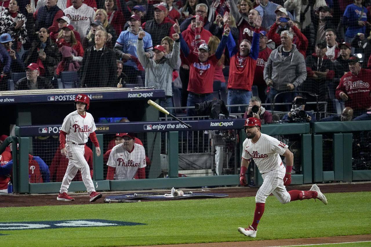 Philadelphia Phillies’ Kyle Schwarber celebrates his home run during the first inning in Game 3 of the baseball NL Championship Series between the San Diego Padres and the Philadelphia Phillies on Friday, Oct. 21, 2022, in Philadelphia. (AP Photo/Matt Rourke)