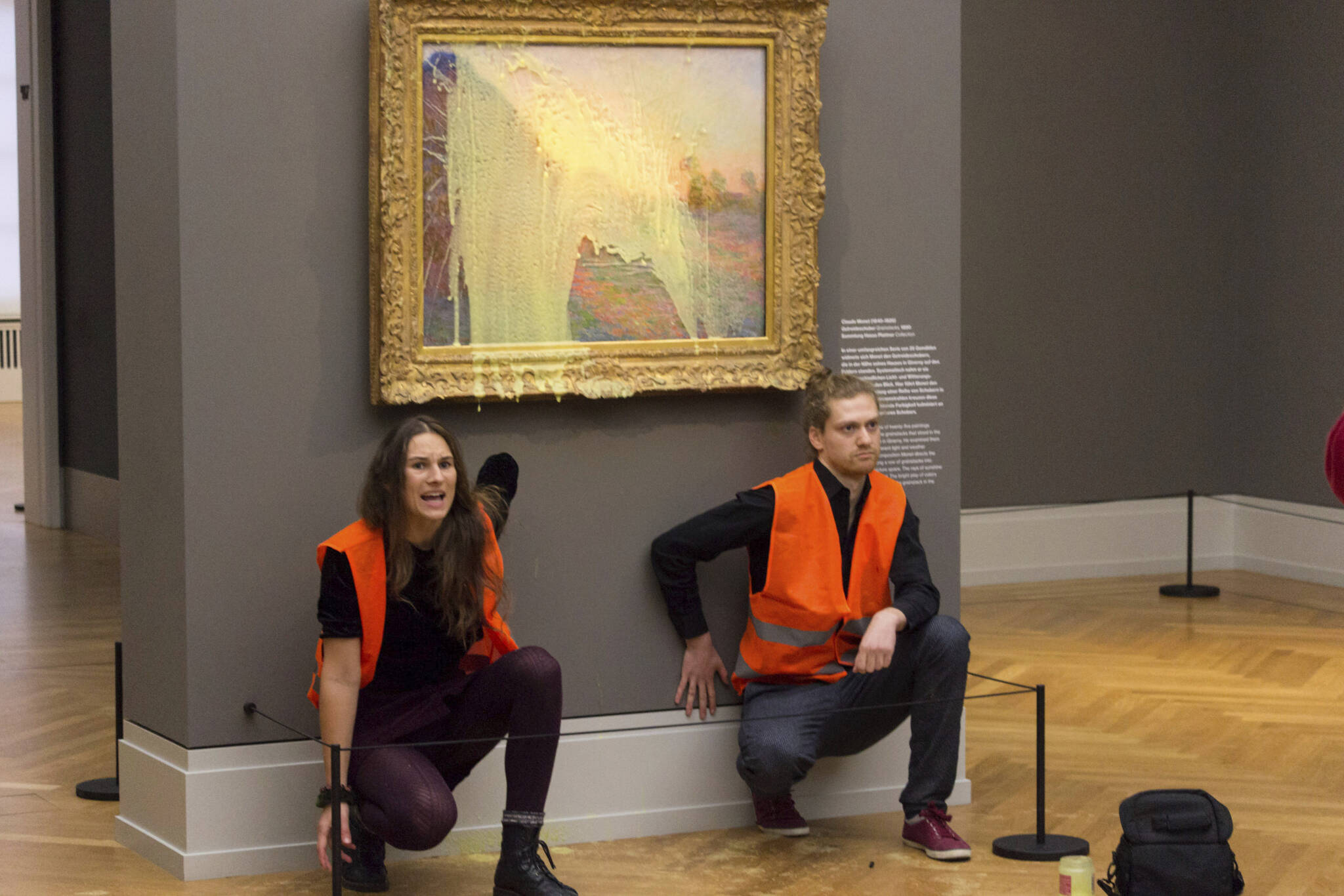 Climate protesters of Last Generation after throwing mashed potatoes at the Claude Monet painting “Les Meulesâ” at Potsdam’s Barberini Museum on Sunday Oct. 24, 2022, to protest fossil fuel extraction. (Last Generation via AP)