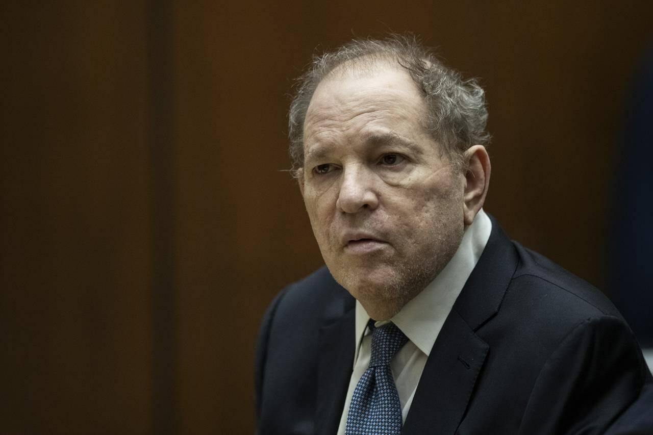 FILE - Former film producer Harvey Weinstein appears in court at the Clara Shortridge Foltz Criminal Justice Center in Los Angeles, Calif., on Oct. 4 2022. Opening statements are set to begin Monday in the disgraced movie mogul Harvey Weinstein’s Los Angeles rape and sexual assault trial. Weinstein is already serving a 23-year-old sentence for a conviction in New York. (Etienne Laurent/Pool Photo via AP, File)