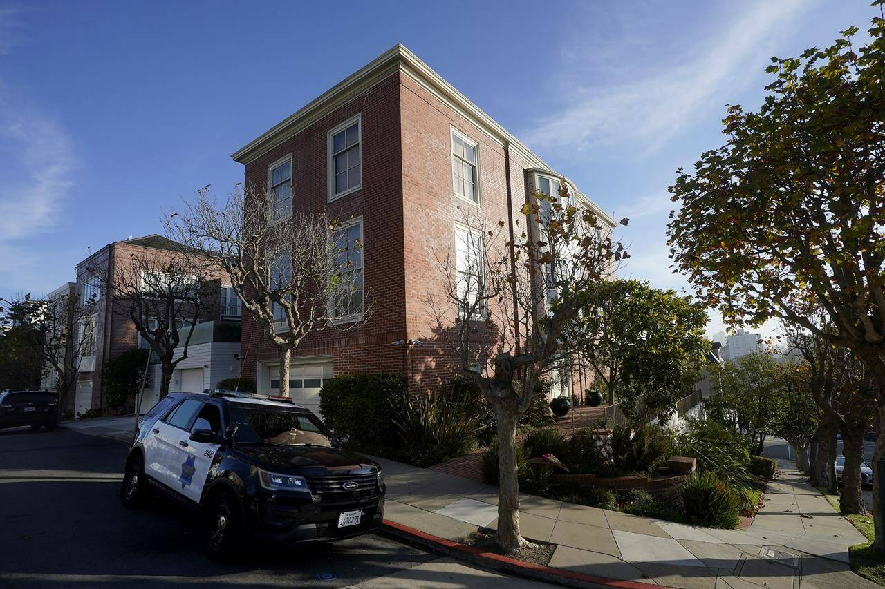 A San Francisco Police Department vehicle parks outside the home of Paul Pelosi, the husband of House Speaker Nancy Pelosi, in San Francisco, Saturday, Oct. 29, 2022. David DePape, accused of breaking into House Speaker Nancy Pelosi’s California home and severely beating her husband with a hammer appears to have made racist and often rambling posts online, including some that questioned the results of the 2020 election, defended former President Donald Trump and echoed QAnon conspiracy theories. (AP Photo/Jeff Chiu)