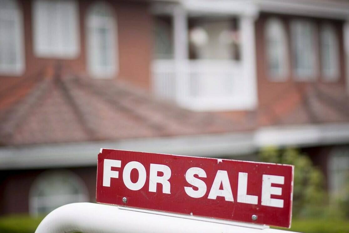 A real estate sign is pictured in Vancouver, B.C., Tuesday, June, 12, 2018. THE CANADIAN PRESS Jonathan Hayward
